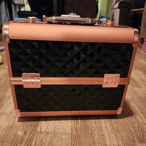 Expandable black and rose gold train case